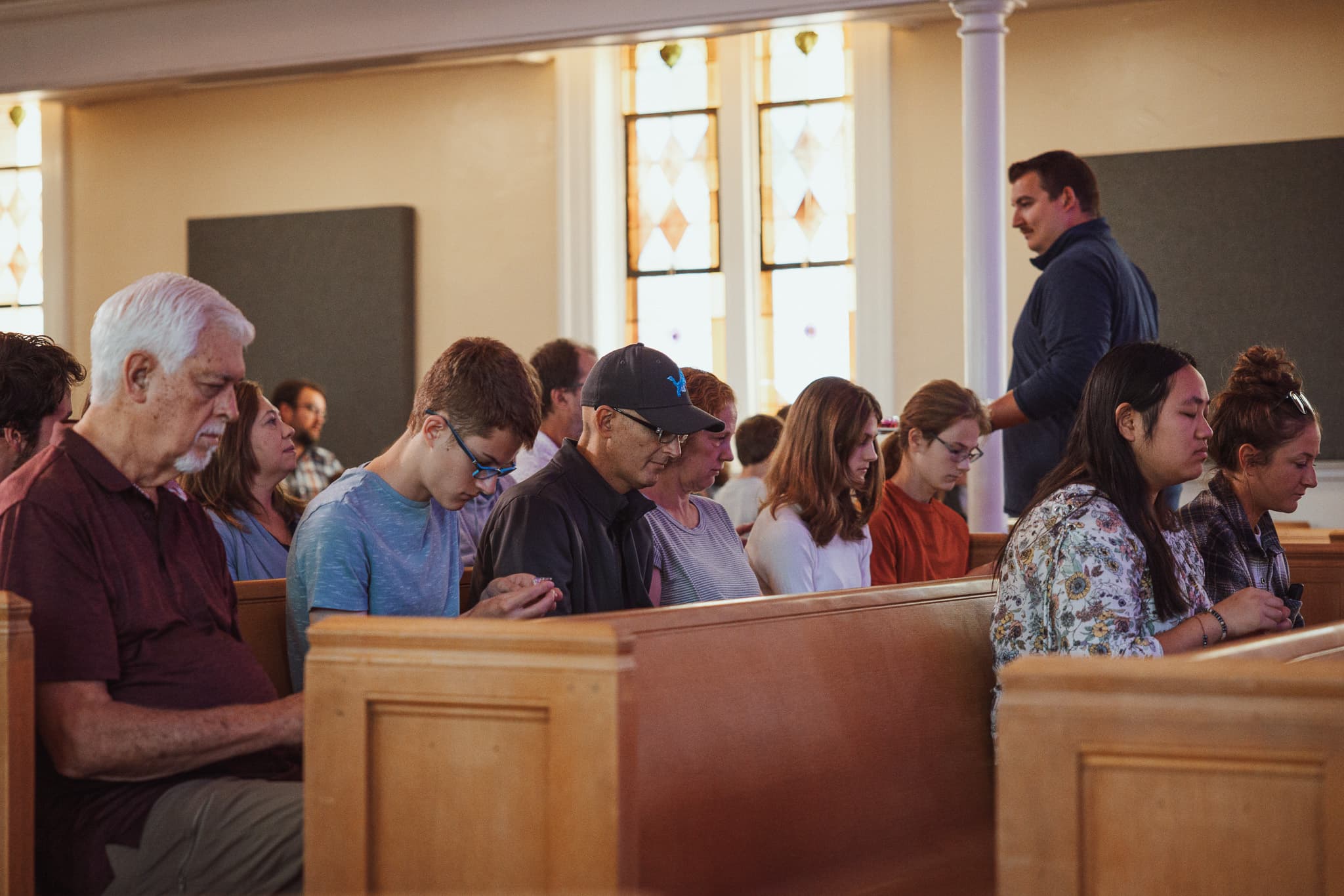 People gathered in worship at River City Church