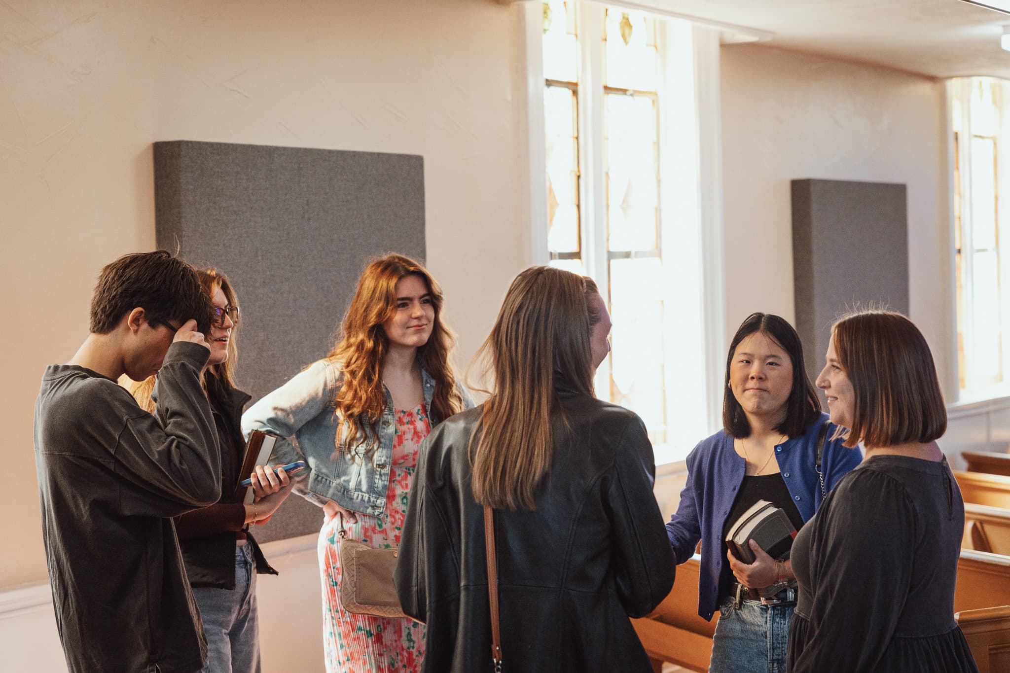 People talking in the sanctuary