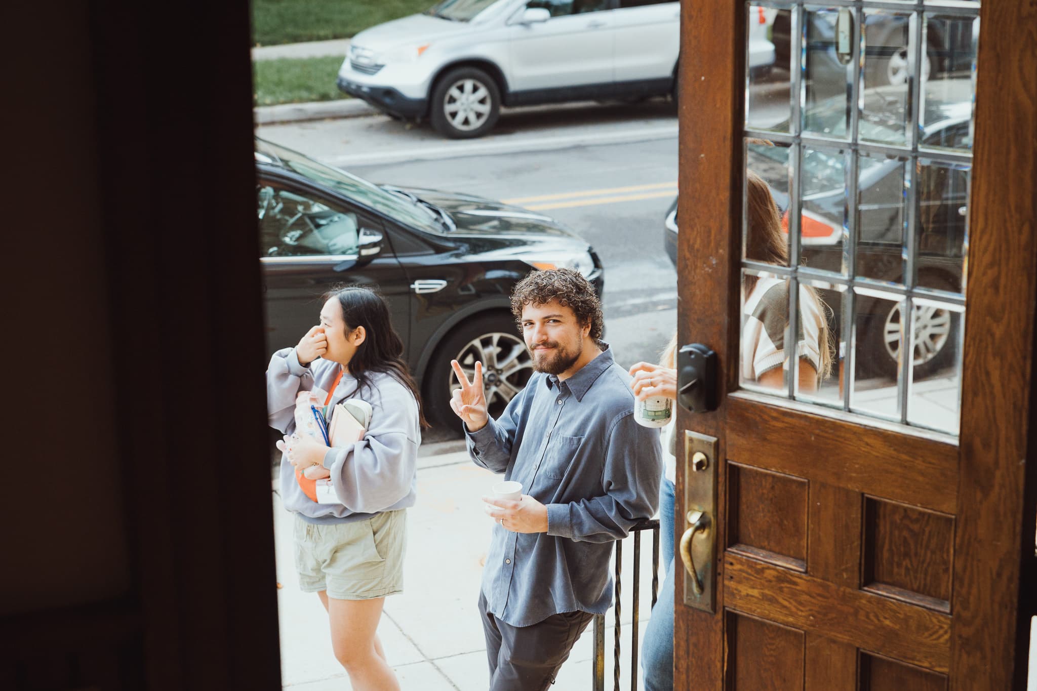People arriving and talking at River City Church