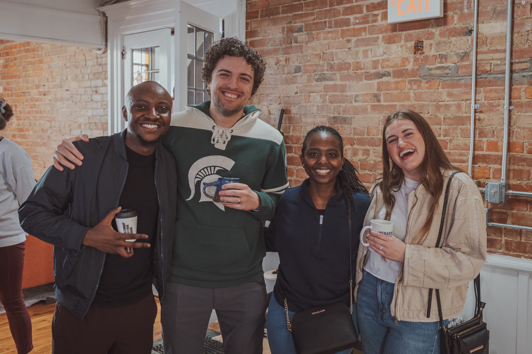 River City Church people in conversation before gathering